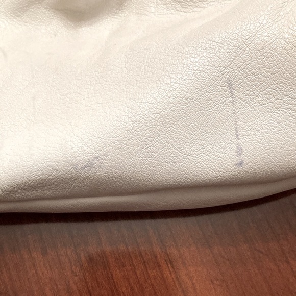 COACH PURSE. Bone colored with tan trim. Pleated. Back slip pocket. Clean inside - Picture 9 of 10